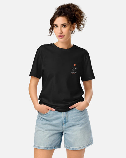 Model posing with black t-shirt