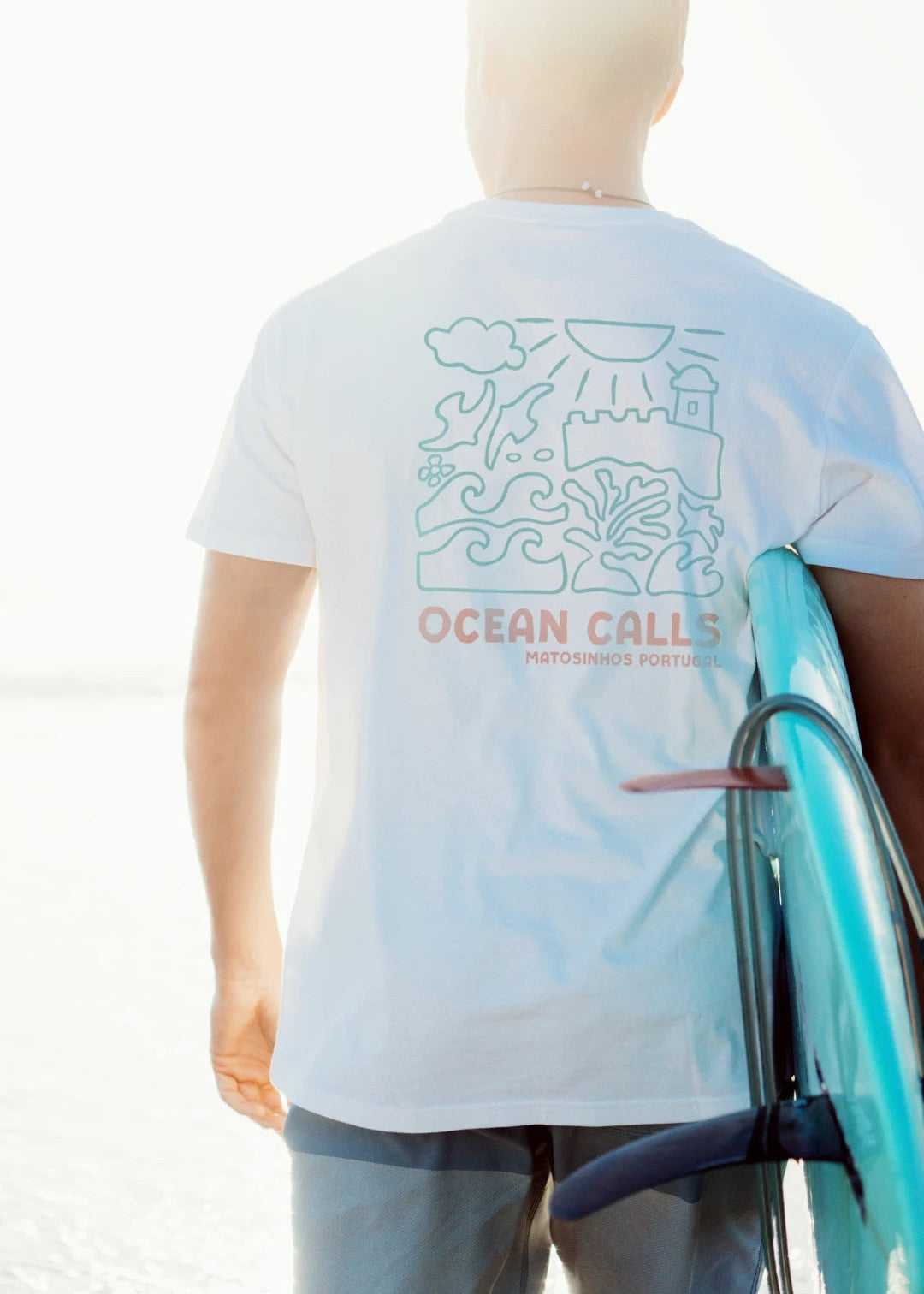 Surfer wearing white T-Shirt
