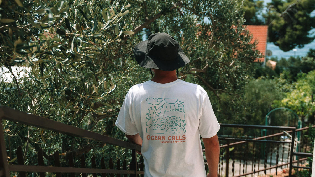 Sandbreese Matosinhos white T-shirt worn by a man outdoors