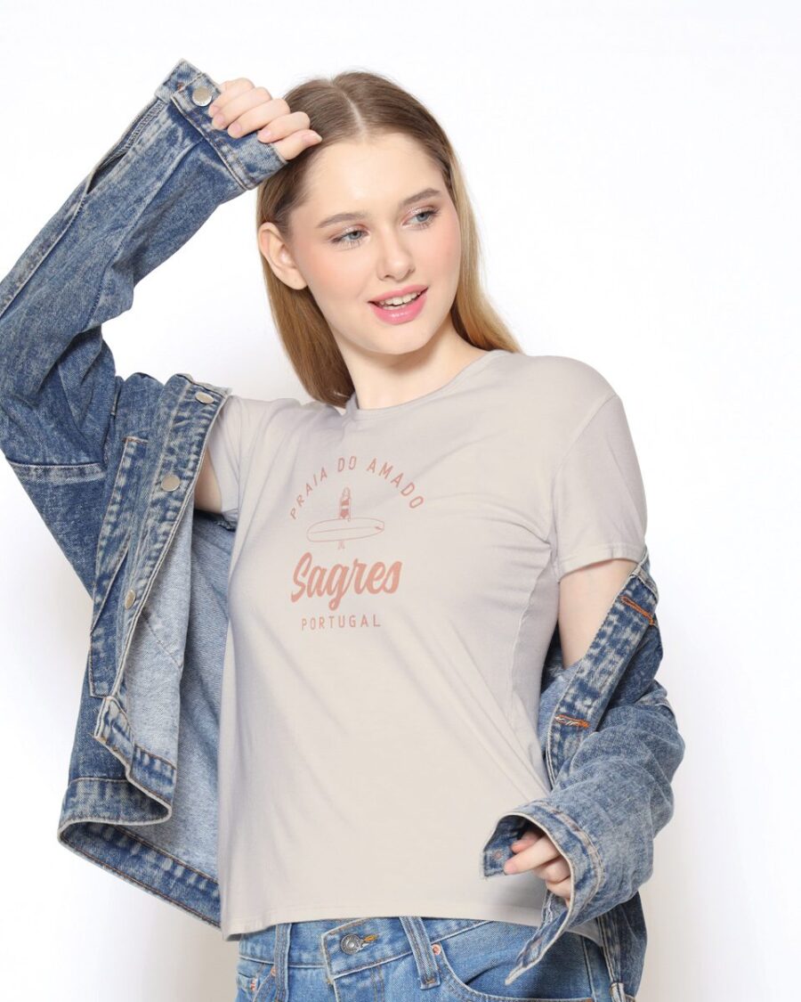 Soft women’s T-shirt in pearl color inspired by Amado Beach, Sagres, Portugal. Flattering fit, breathable fabric, and stylish coastal design perfect for summer beach days or casual wear.