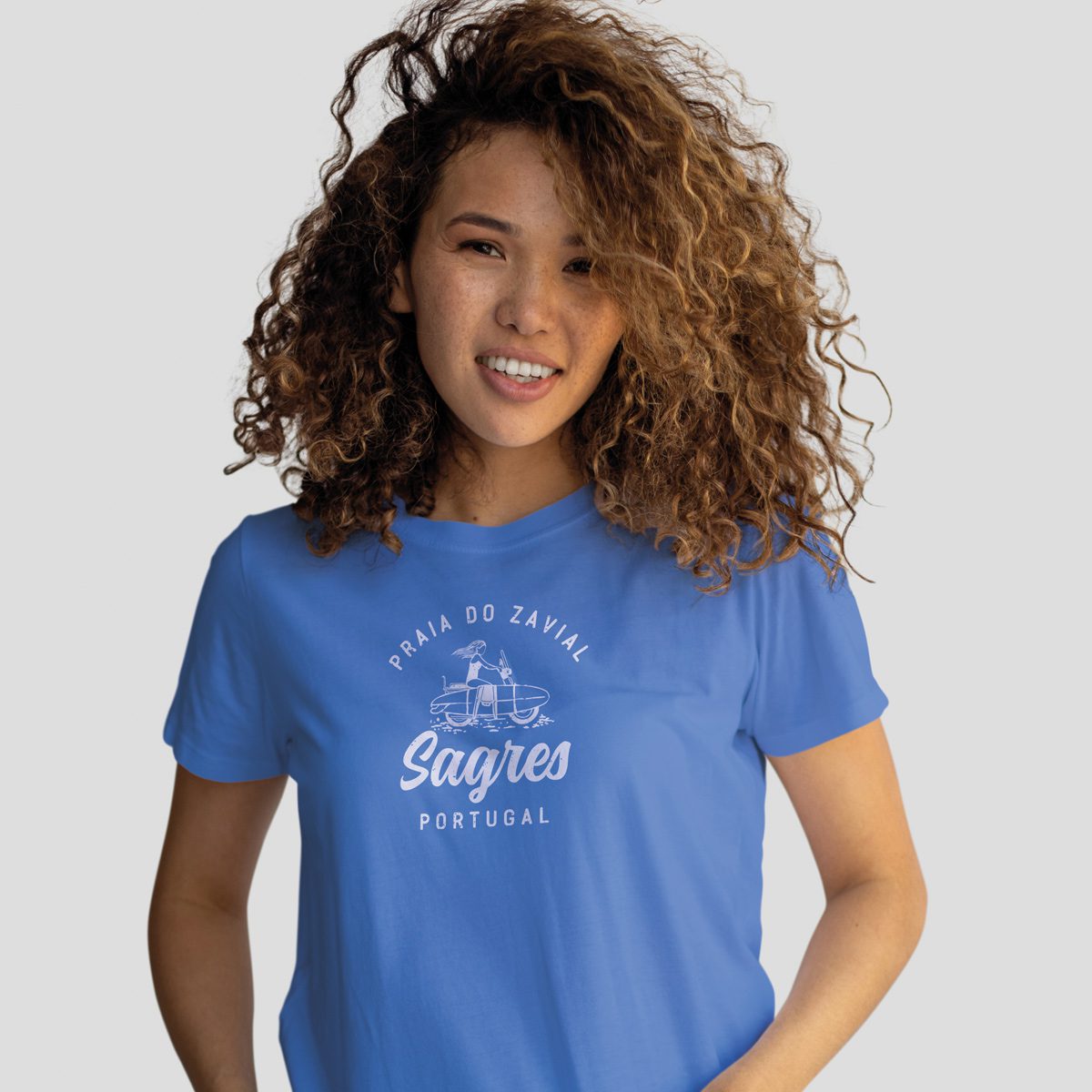 Colorful Crayola-inspired women’s T-shirt featuring Zavial Beach, Sagres, Portugal. Soft, breathable fabric with a flattering fit – perfect for summer beach days or casual coastal style.