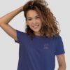 Elegant women’s T-shirt in navy featuring a minimalist “Between Salt and Sky” illustration inspired by Beliche Beach. Soft, breathable fabric with a flattering fit – perfect for coastal lovers, beach trips, or casual summer wear.