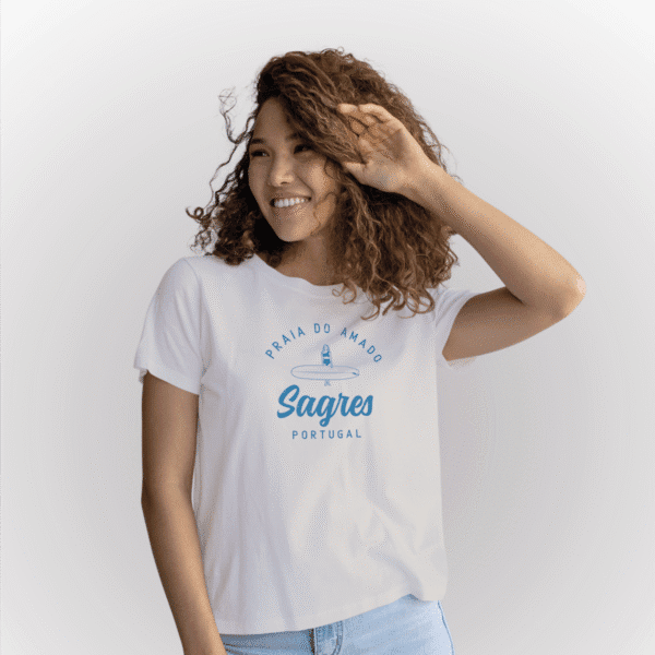Soft women’s T-shirt in porcelain color inspired by Amado Beach, Sagres, Portugal. Flattering fit with breathable fabric and a stylish coastal graphic – perfect for summer beach days and casual wear.